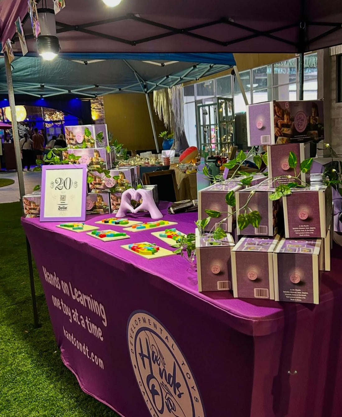 Guests interacting with Hands on Developmental Toys’ booth at the Sharing the Love in Anaheim event.