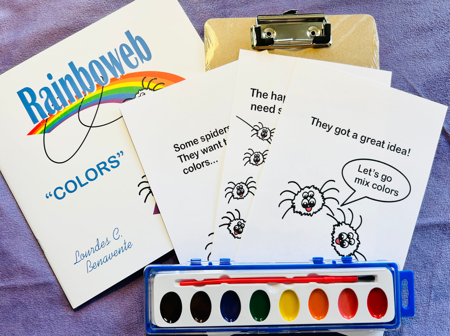 Rainboweb Colors- A book for children so they can have fun while learning the colors. Comes with a coloring kit!  Written by Lourdes Benavente